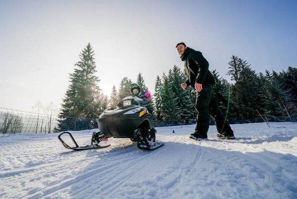 Electric Snow Mobiles on the pistes - Activity in Les Gets